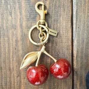 Coach Glitter Cherry Keychain with Gold Leaf